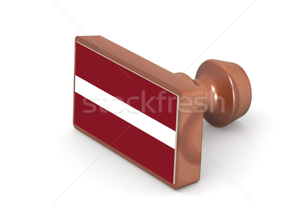 Wooden stamp with Latvia flag Stock photo © tang90246