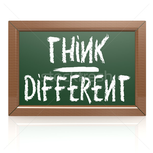 Think Different written with chalk on blackboard Stock photo © tang90246