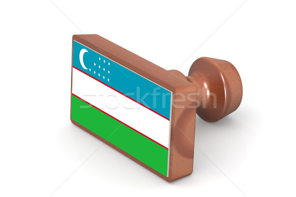 Wooden stamp with Uzbekistan flag Stock photo © tang90246