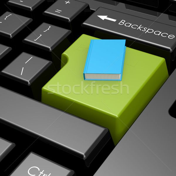 Blue book on green button of computer keyboard Stock photo © tang90246