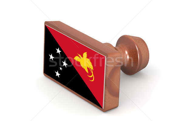 Wooden stamp with Papua New Guinea flag Stock photo © tang90246