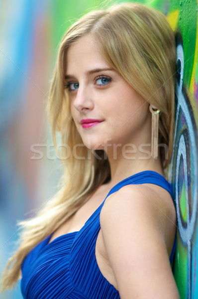 Blond girl on graffiti wall   Stock photo © tangducminh