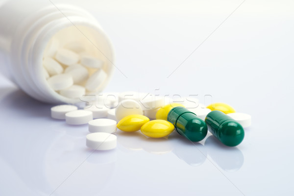 Recept drog tabletták különböző üveg fehér Stock fotó © tangducminh
