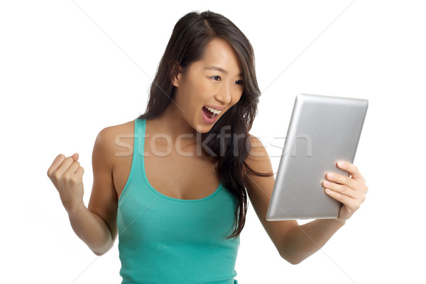 Emocionante Asia mujer digital tableta Foto stock © tangducminh