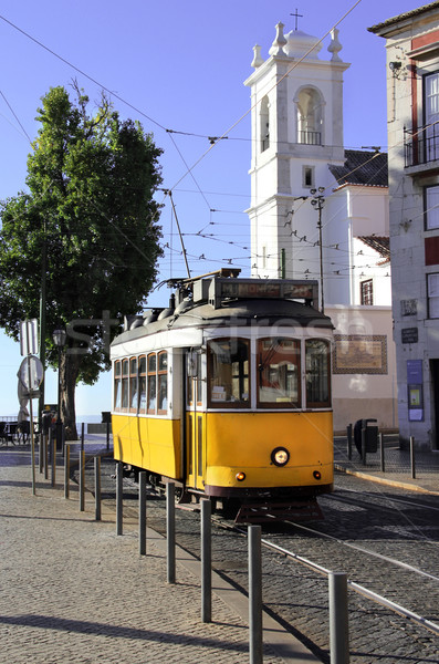 Historical Lisbon yellow tramway in vivid colors Stock photo © tannjuska