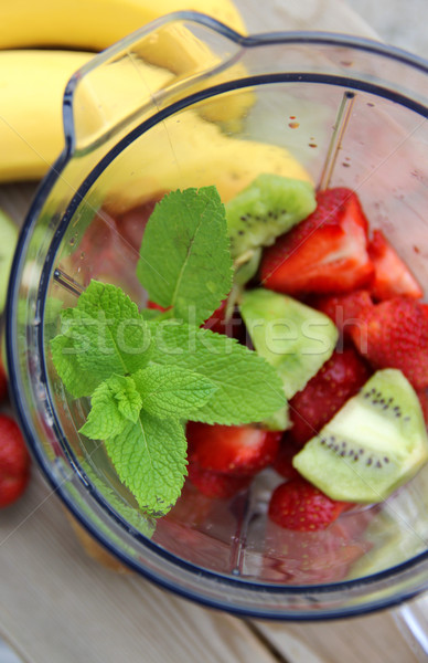 Stock photo: Fresh fruits in the blender 