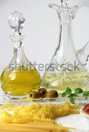 Olive oil, vinegar and basil Stock photo © tannjuska