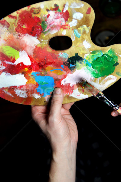 Artist paints a picture Stock photo © tannjuska