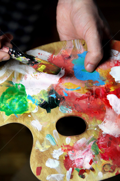 Artist paints a picture Stock photo © tannjuska