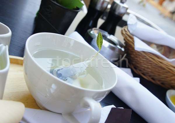 Green tea in the white cup Stock photo © tannjuska