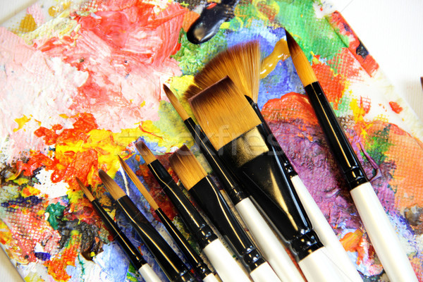 Paintbrushes and art palette Stock photo © tannjuska