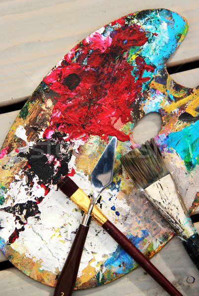 Art palette and mix of paintbrushes  Stock photo © tannjuska