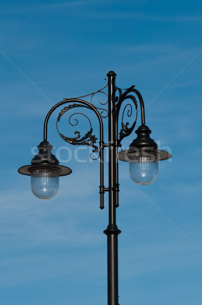 retro street lamp on blue sky background Stock photo © tarczas