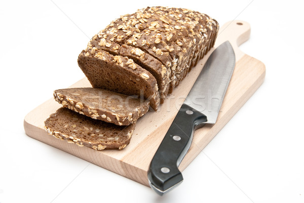 sliced wholemeal bread on kitchen board  Stock photo © tarczas