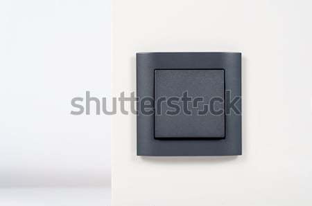 Fekete villanykapcsoló fehér fal Stock fotó © tarczas