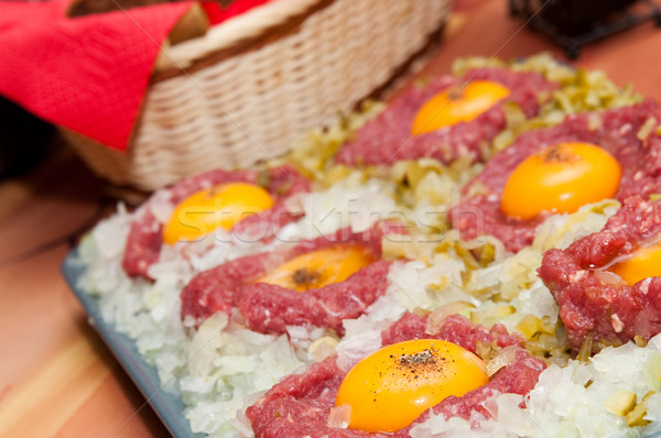 tartar steak with egg onion and pickle Stock photo © tarczas