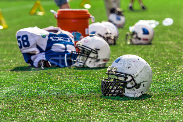 Stock photo: American Football Helmet on the Field