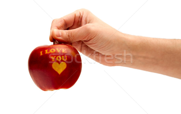ripe red apple with the words 'I love you' holding in hand Stock photo © tarczas