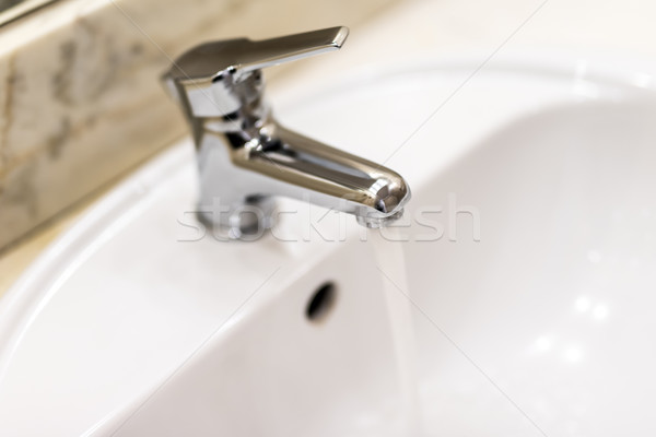 washbasin and faucet with water drop at home Stock photo © tarczas