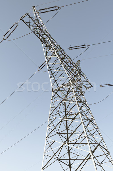 Pylon and transmission power line in sunset Stock photo © tarczas