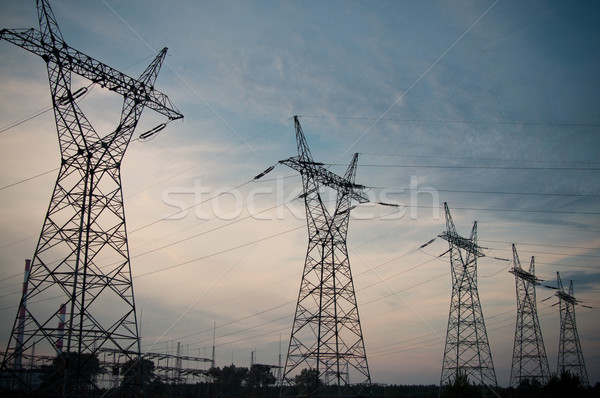 Pylon and transmission power line in sunset Stock photo © tarczas