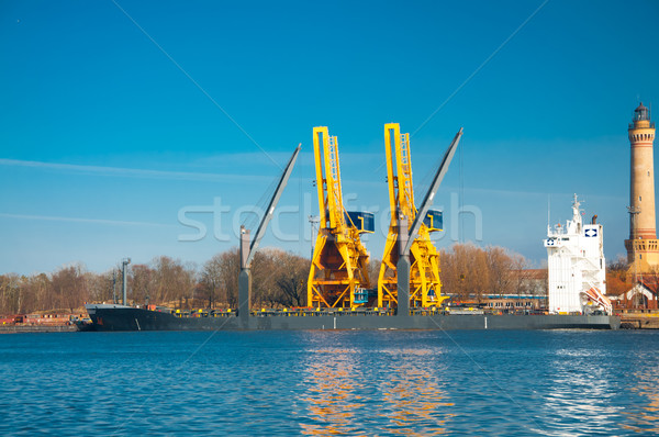unloading a ship in the sea port Stock photo © tarczas