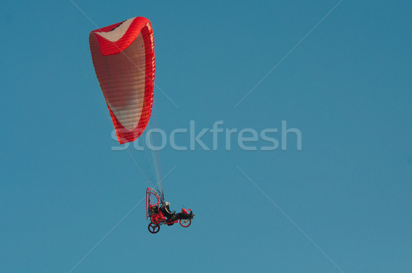 red paraglider on the blue sky Stock photo © tarczas