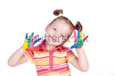 Gyönyörű kislány kezek festék izolált fehér Stock fotó © TarikVision