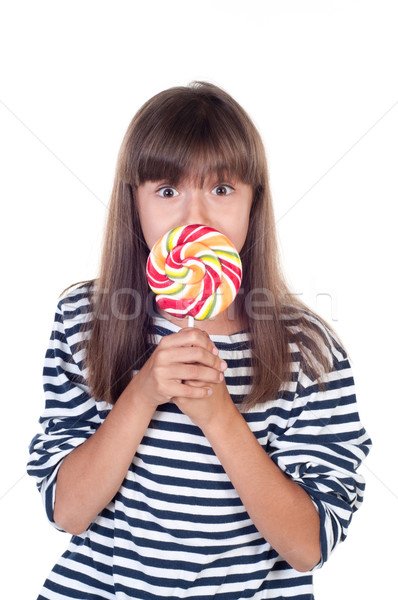 Cute fun little girl holding big lolly pop Stock photo © TarikVision