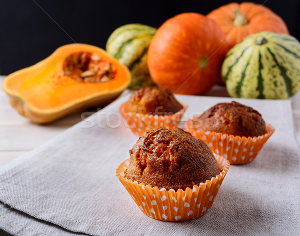 Sweet pumpkin muffins and ripe squashes Stock photo © TasiPas