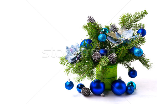 Christmas arrangement silk poinsettias, blue baubles, copy space Stock photo © TasiPas