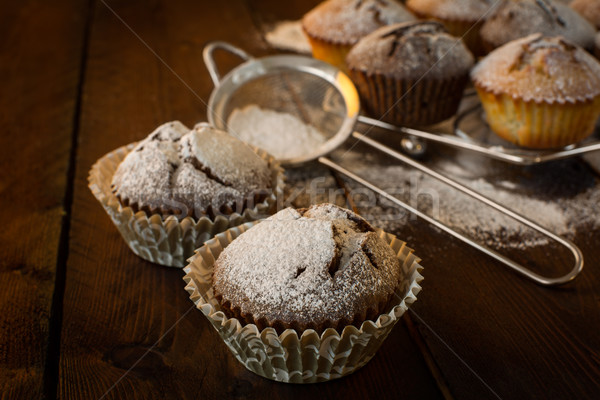 Muffins and baking sieve Stock photo © TasiPas