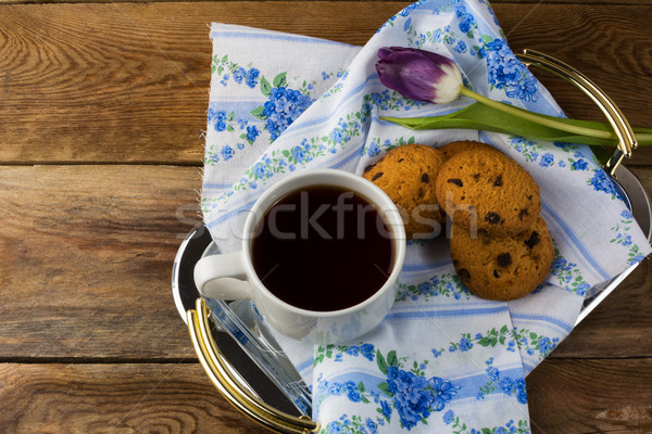 Cup of tea and cookies on serving tray Stock photo © TasiPas