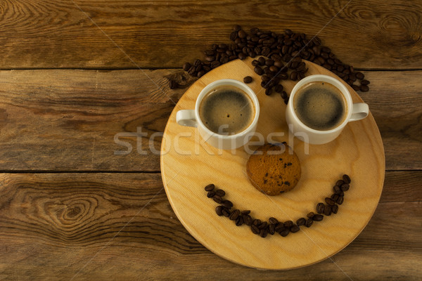 Komik kahve fincanları yüz ahşap sabah kahve fincanı Stok fotoğraf © TasiPas