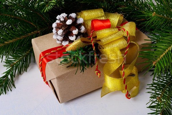 Stock photo: Christmas background with kraft paper wrapping Christmas present
