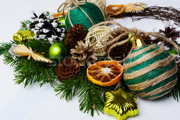 Christmas arrangement with rustic ornaments and dried orange sli Stock photo © TasiPas