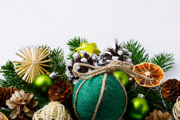 Christmas decoration with handmade twine decorated bauble Stock photo © TasiPas