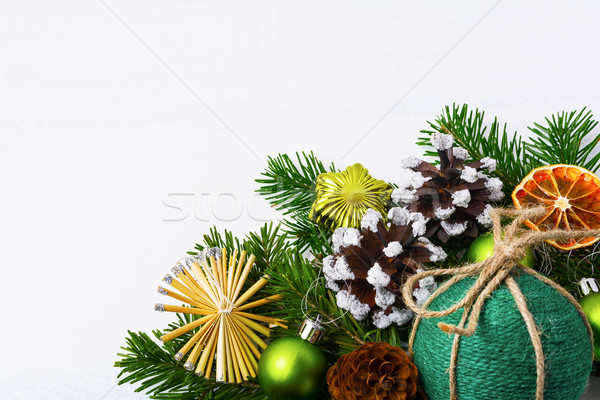 Christmas background with green handmade twine ornament, copy sp Stock photo © TasiPas