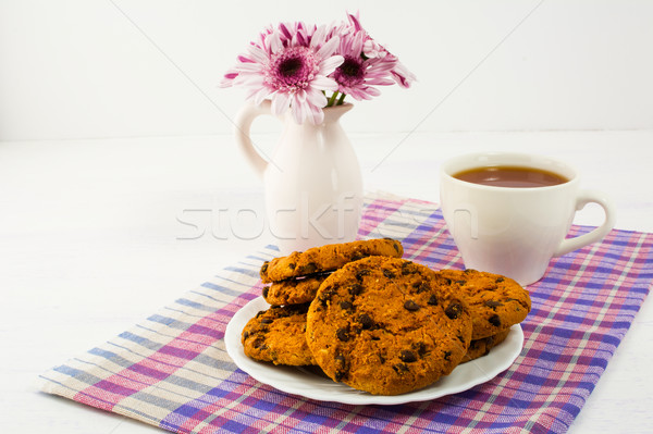 Thé cookies servi à carreaux serviette maison [[stock_photo]] © TasiPas