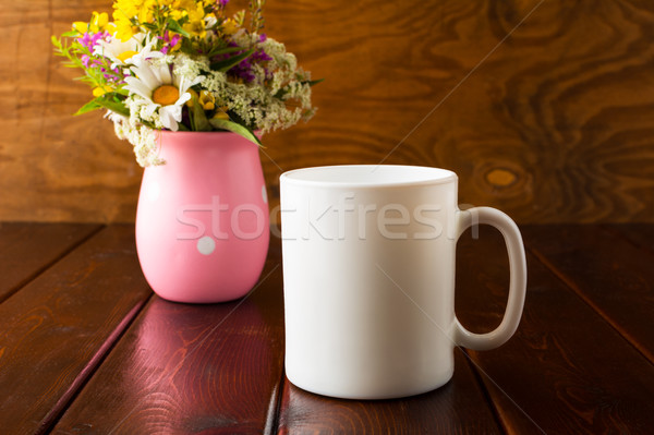 Blanco taza de café flores silvestres vacío taza Foto stock © TasiPas