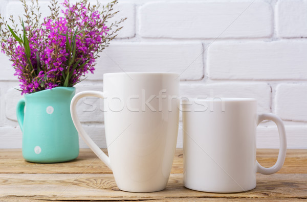 Two white coffee and cappuccino mug mockup with maroon purple fl Stock photo © TasiPas