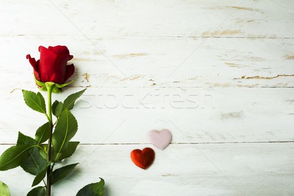 Rose and silk hearts background  Stock photo © TasiPas