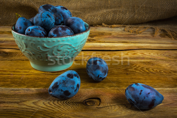 plum prunes in a turquoise cup Stock photo © TasiPas