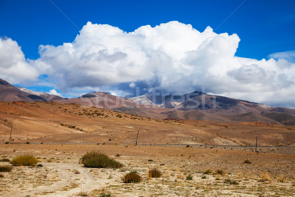 Route prairie montagnes ciel bleu nuages Russie Photo stock © TasiPas