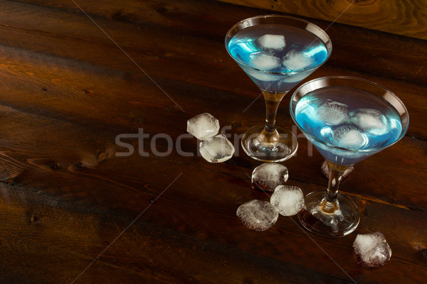 Blue cocktail with ice, copy space Stock photo © TasiPas