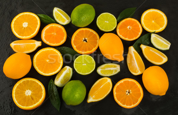 Cal limão laranja tangerina preto alimentos frescos Foto stock © TasiPas