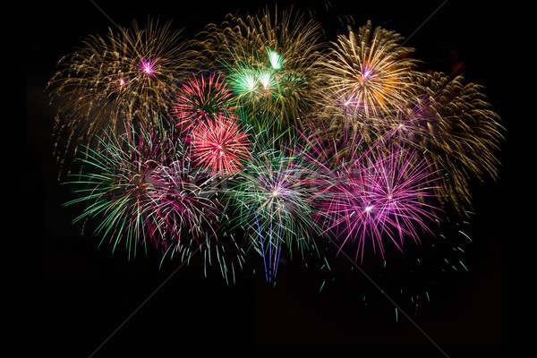 Beautiful celebration golden, red, purple, green sparkling firew Stock photo © TasiPas
