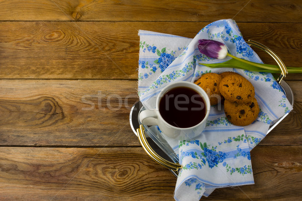 Breakfast tea in serving tray on wooden background Stock photo © TasiPas