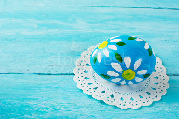 Нand-painted blue Easter egg  Stock photo © TasiPas