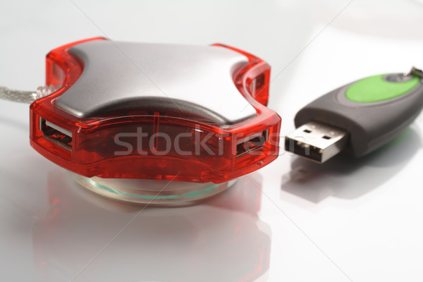 Four port red USB hub and flash memory Stock photo © Tatik22